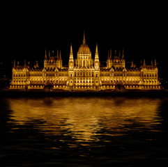 Fototapeta premium Budapest Parliament in Hungary at night on the Danube river