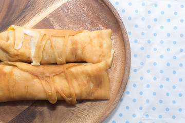 crepe roll with egg,Thai dessert on plate