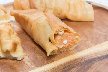 crepe roll with egg,Thai dessert on plate