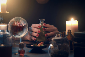 Witchcraft. The hands of witches, magic ball