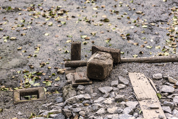 the bottom of the drained pond with drainage and leaves
