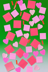 Several sheets of paper on green