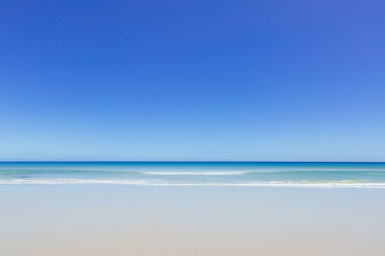 An empty beach during summer in Australia