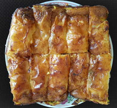 Homemade cheese strudel on a tray