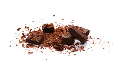 Pile chopped, milled chocolate with shavings isolated on white