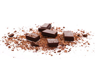 Pile chopped, milled chocolate with shavings isolated on white