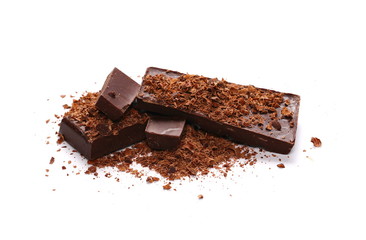 Pile chopped, milled chocolate with shavings isolated on white