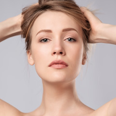 Naklejka premium Portrait of young caucasian woman with perfect skin clean