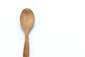 wooden spoon on the white background