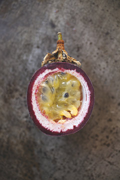 close up of home grown organic passionfruit cut in half