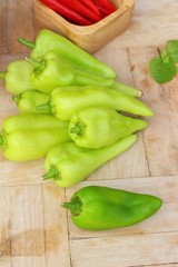 Green bell pepper and red chili