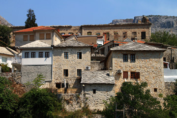 Fototapeta na wymiar Stone buildings near famous Old bridge in Mostar , Bosnia and Herzegovina