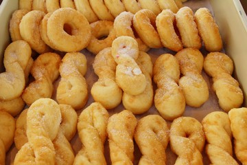 A lot of donut and strawberry jam