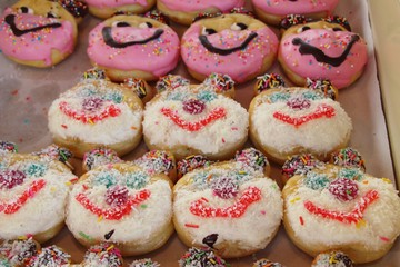 A lot of donut and strawberry jam