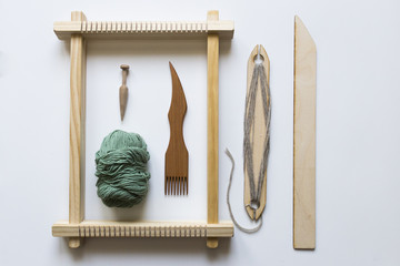 Weaving loom, tools and yarn