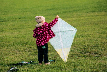 Little girl with a kite