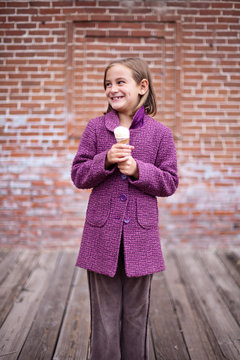 Happy girl with ice cream