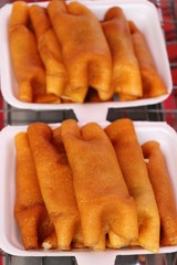 Pancakes roll filled with sausage is delicious