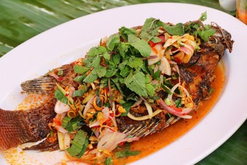 Fried snapper spicy mix vegetable is delicious
