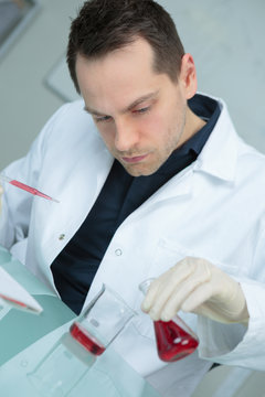 young scientist studying new substance