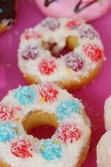 A lot of donut and strawberry jam