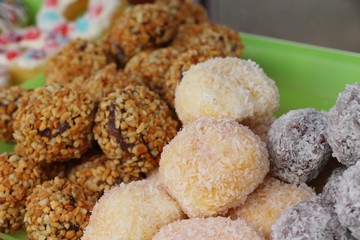 A lot of donut and strawberry jam