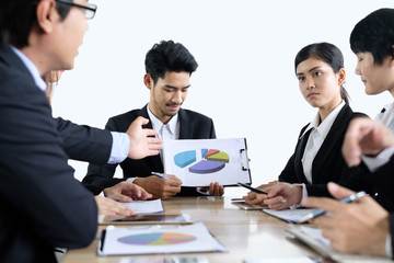 Asian business people meeting time,manager listening his staff brainstorming discussing about new startup project together in conference room at office,business colleagues teamwork concept