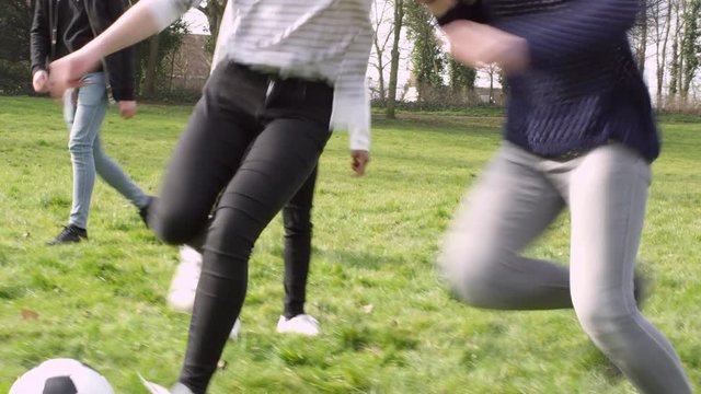 Group Of Teenagers Playing Soccer In Park Shot On R3D