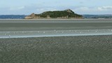 Le rocher de Tombelaine dans la baie du Mont-Saint-Michel
