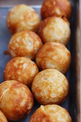 Takoyaki is delicious Japanese food on pan