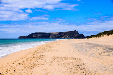 Fototapeta na wymiar Beach at Porto Santo Island looking south towards Ilheu da Cal