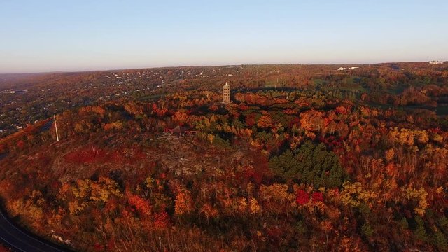 Enger Tower sits on top of Duluth, Minnesota hillside, aerial