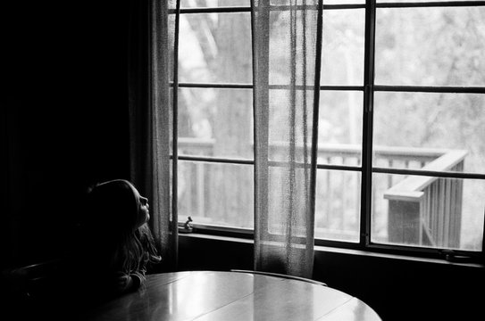 Ava Looking out Window