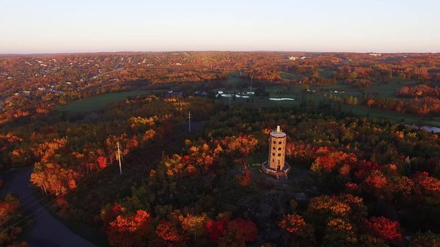 Enger Tower on Minnesota hillside at sunset, aerial