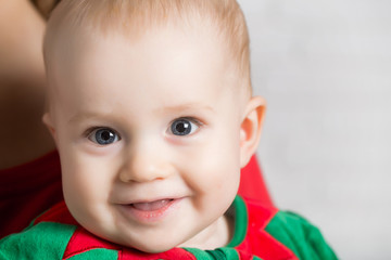Christmas child with happy face.