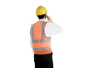 Young foreman is talking on a mobile phone