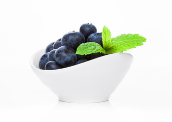 Fresh healthy organic blueberry in white bowl