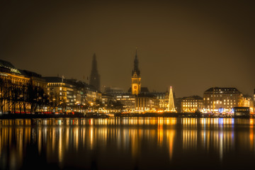 Illuminated Hamburg Christmas Market with town hall