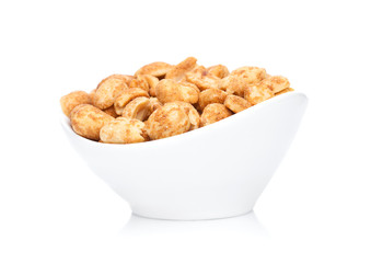 Salty peanuts snack in white bowl