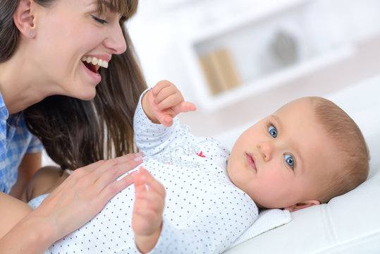 mother and baby happy family moms love and tenderness