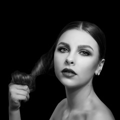 Fototapeta premium Fashionable portrait of a girl model. Fashion, accessories, evening wet effect makeup. 