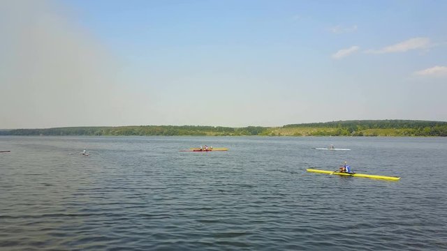 Athletes Training On Kayaks