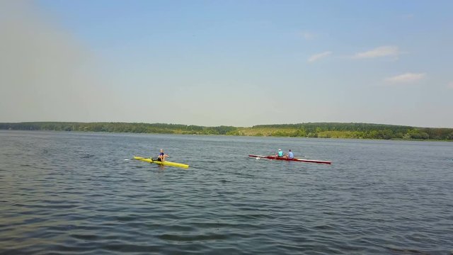 Kayakers Training On Canoe