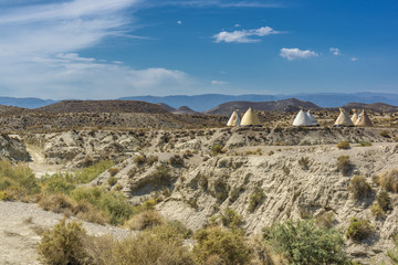 Andalusia desert. Desert landscape at sunrise in the desert of Tabernas in Andalusia with tents.