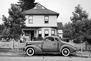 Victorian house with car