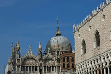 Fototapeta na wymiar Fragment of beauty Saint Mark's Basilica and Doge's Palace at San Marco square or piazza, Venezia, Venice, Italy, Europe 