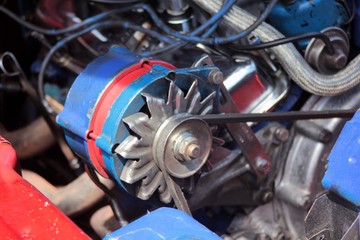 Old technology engine with v-belt and cogwheel