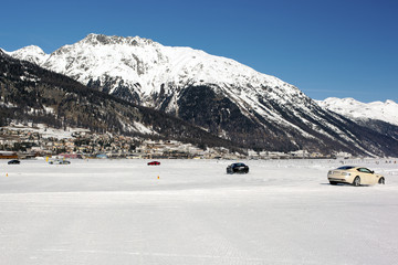 Cars on the snow and a beautiful landscape