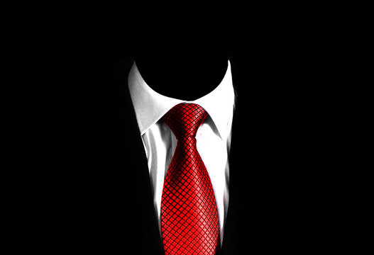 Business Man Suit With A Red Tie On A Black Background