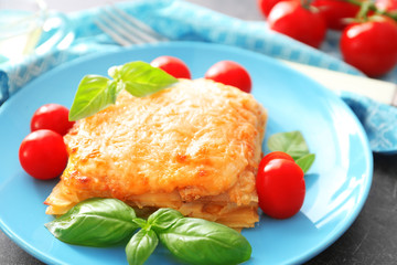 Plate with tasty lasagna, close up